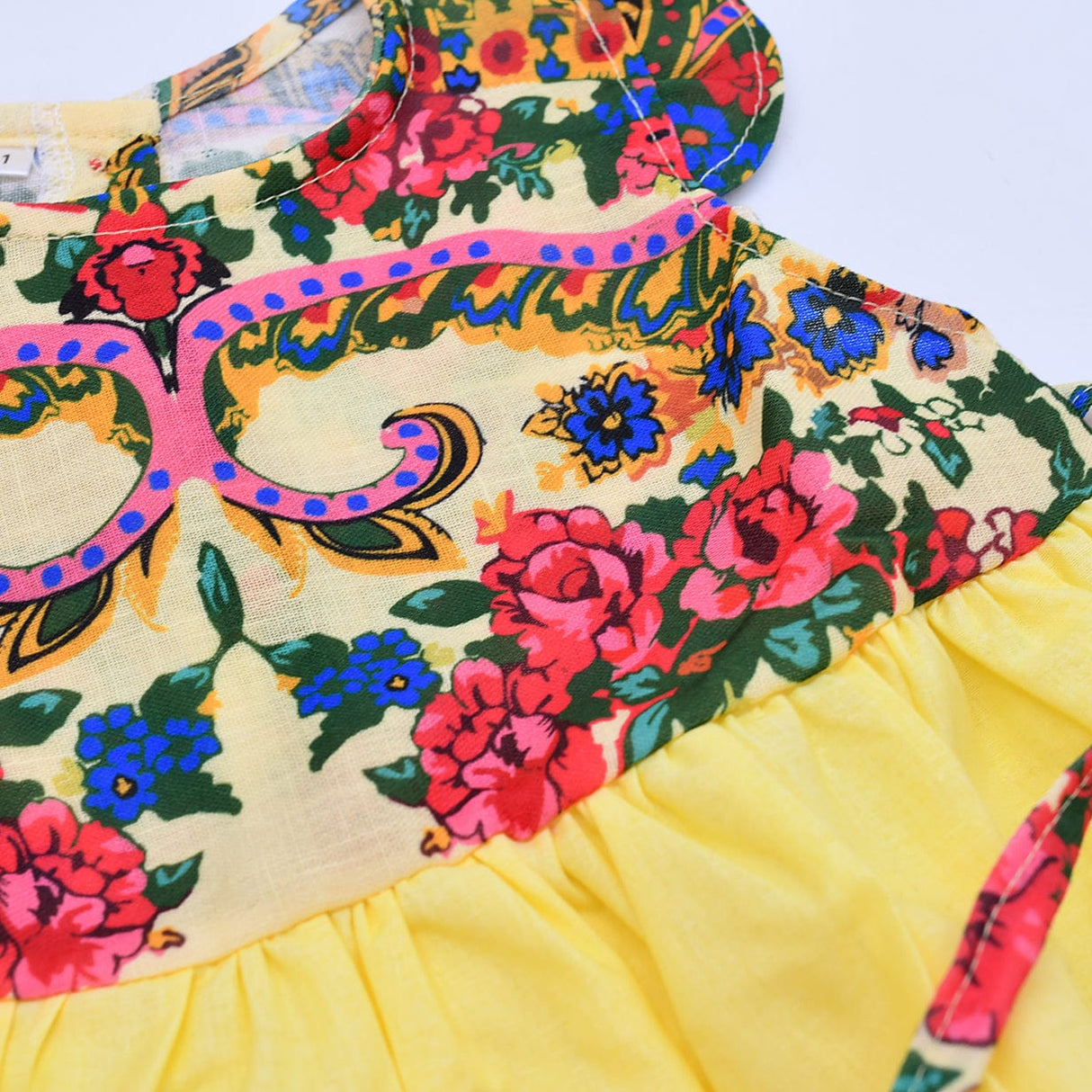 Robe enfant portugaise jaune à motifs floraux Viana Robe enfant à motifs Viana - Jaune