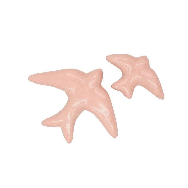 Hirondelle traditionnelle en céramique rose