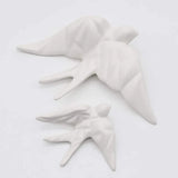 hirondelle en céramique stylisée et modernisée blanche, dans sa boîte cadeau Luisa Paixão.  Coffret hirondelle stylisée - Blanc