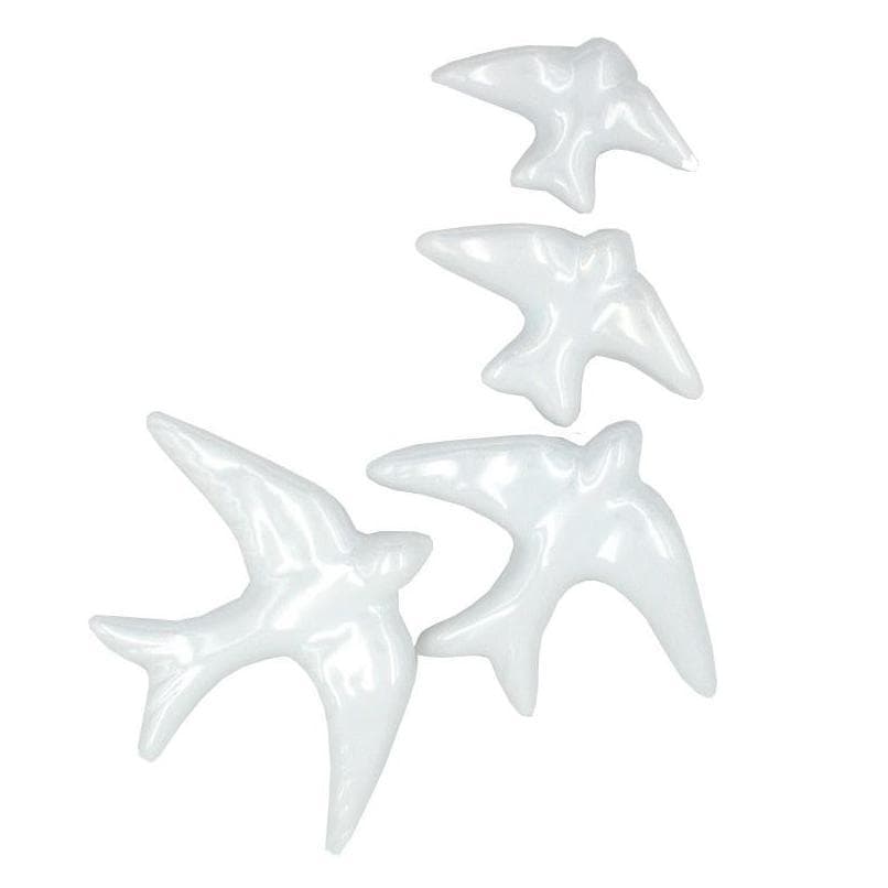Hirondelle traditionnelle en céramique blanche
