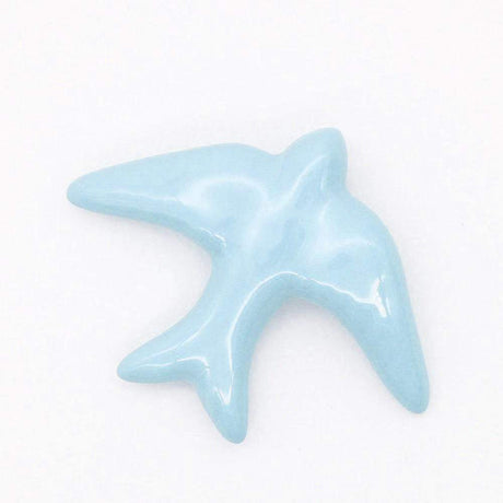Hirondelle traditionnelle en céramique bleu ciel