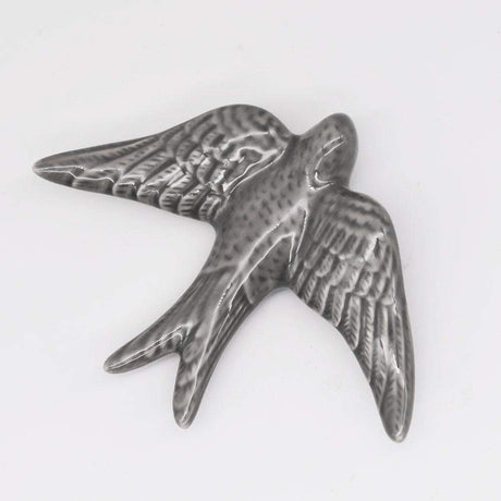 Hirondelle en céramique grise