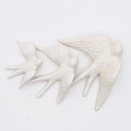 Hirondelle portugaise traditionnelle en céramique blanche Hirondelle traditionnelle en céramique blanche