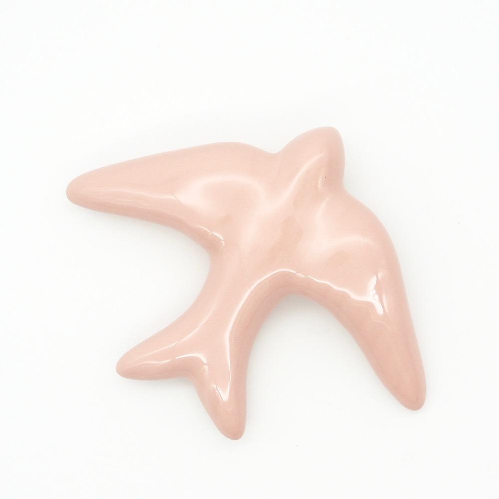Hirondelle traditionnelle en céramique rose