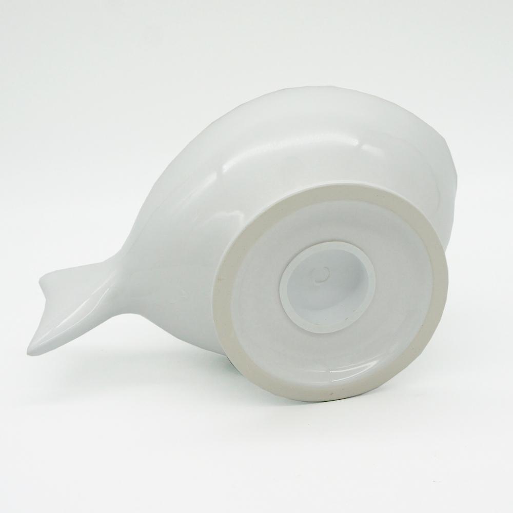 Tirelire en céramique blanche